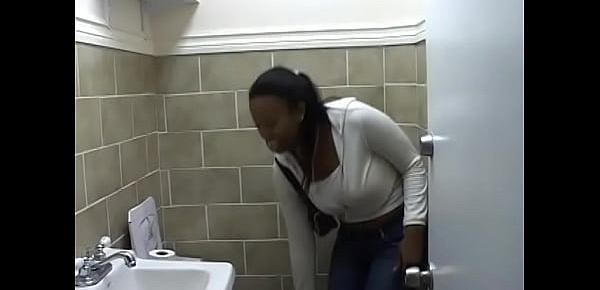  Black beauty takes off her lace panties and pee in the bathroom